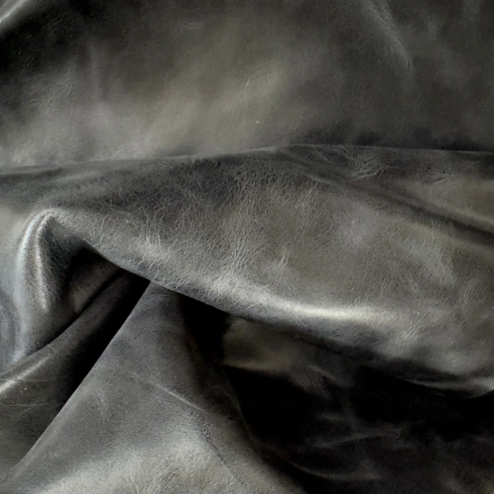 Folded black leather with