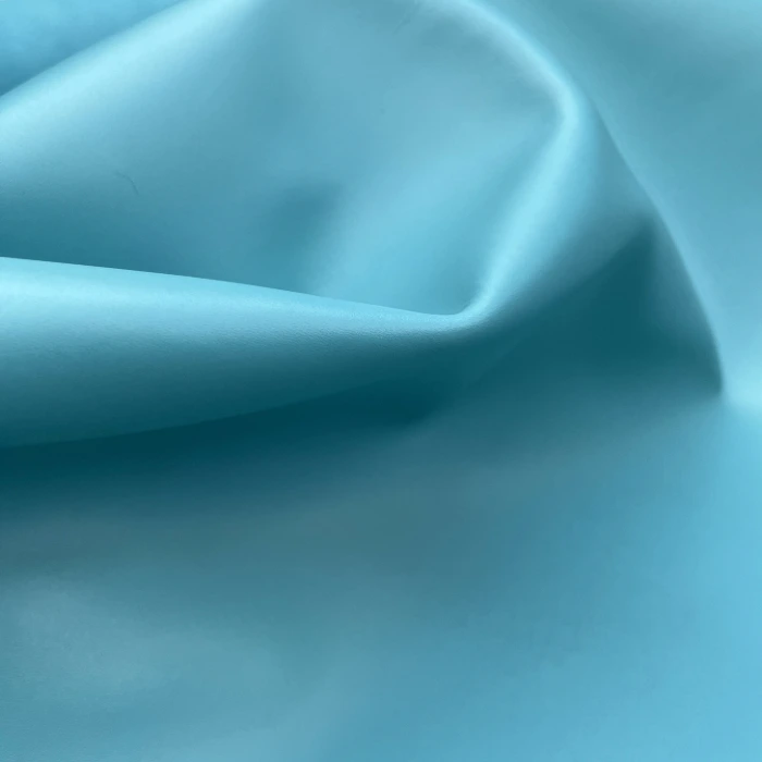 Light blue leather with a smooth surface